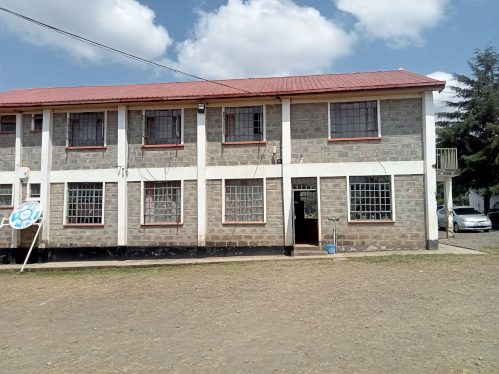 Students engaged in learning at Enoomatasiani Girls Secondary School